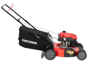 Photo of Craftsman CM11A-A2C2093 red gas-powered lawn mower with black grass bag, side view on white background.