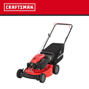 Photo of Craftsman lawn mower CM11A-A2C2093, red and black, side angle, with grass bag attached on white background.