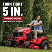 Photo of Craftsman T2200K lawn tractor CM13APA9ZSA93, red body, mowing grass outdoors.