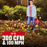 Photo of CRAFTSMAN leaf blower CMCBL700M1 in use outdoors, blowing leaves with text showing 380 CFM and 100 MPH.
