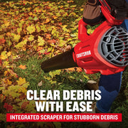 Photo of Craftsman leaf blower CMCBL700M1 in use clearing autumn leaves from grass.