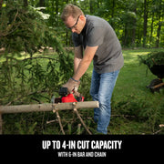 Photo of person using CRAFTSMAN chainsaw CMCCS320D1 outdoors to cut tree branches, highlighting up to 4-in cut capacity.