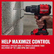 A CRAFTSMAN cordless drill is being used to drill into a concrete block. The drill features a variable speed and a 2-speed