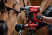 Photo of CRAFTSMAN CMCF940M1 cordless impact wrench in use, red and black color, close-up side angle.