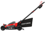 Photo of Craftsman CMCMW220P2 lawn mower, side view, red and black body with rear grass bag, white background.