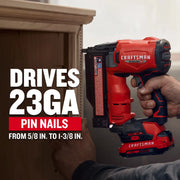 Photo of Craftsman pin nailer CMCN623C1 driving 23GA pin nails into wood, close-up side angle.