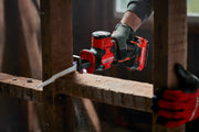 Photo of Craftsman cordless reciprocating saw CMCS340B cutting through a wooden beam during construction.