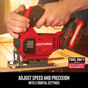 Photo of CRAFTSMAN cordless jigsaw CMCS600B on wood, showing speed adjustment and ergonomic handle.