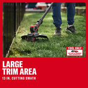 Photo of CRAFTSMAN cordless string trimmer CMCST901B being used to edge grass along a fence, 13 in. cutting swath.