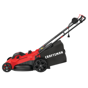 A red and black electric lawn mower with large rear wheels and a grass collection bag labeled 'CRAFTSMAN', shown from the side against a white background.