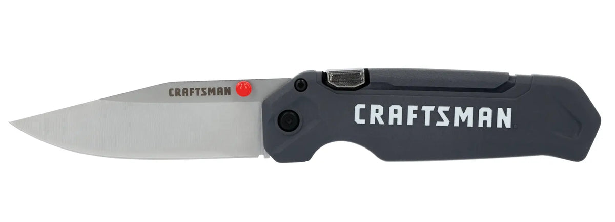 Photo of CRAFTSMAN folding utility knife CMHT10354, black handle, silver blade, side view, white background.