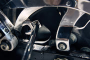 Close-up photo of CRAFTSMAN wrench CMMT12052LZ in use tightening a bolt on a metal mechanism.