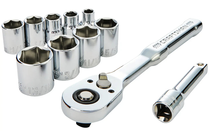 A set of chrome-plated socket wrenches, including a ratchet handle, extension bar, and several different-sized sockets. The handle features branding and the tools are arranged on a white background.