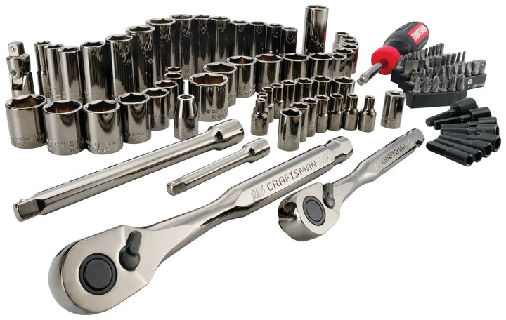 Craftsman CMMT45304 chrome mechanic tool set with ratchets, sockets, screwdriver, and bits, angled on white background.