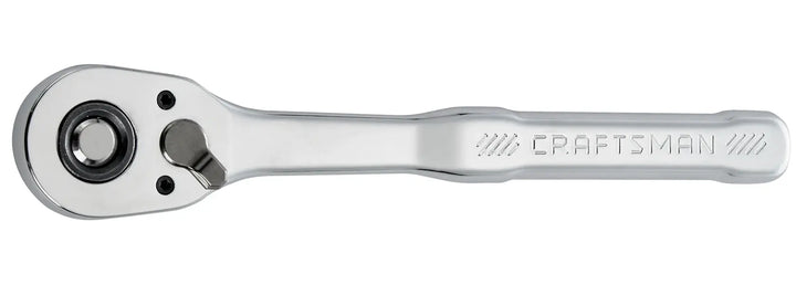 A chrome-finished Craftsman ratchet wrench, showing the top view with the brand name engraved on the handle.