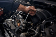 Photo of CRAFTSMAN ratcheting wrench CMMT87375V being used on a car engine, side angle.