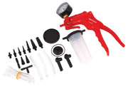 Photo of Craftsman CMMT98287 brake bleeder kit with red pump, gauge, plastic reservoir, assorted adapters on white background.