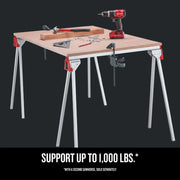Photo of Craftsman sawhorse CMST11154 used as a work table with tools and wood, front angle.