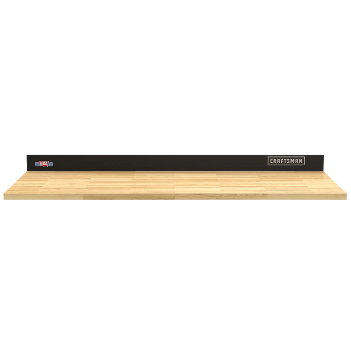 Front view photo of Craftsman wood workbench with black back panel CMST25302BK.