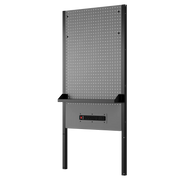 A freestanding black and gray metal pegboard with a small built-in shelf and a power strip attached below the shelf. The pegboard has evenly spaced holes for attaching hooks and tools, and is supported by two vertical legs.
