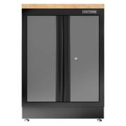 Black metal storage cabinet with double doors and lock, wooden top, CRAFTSMAN logo on front.