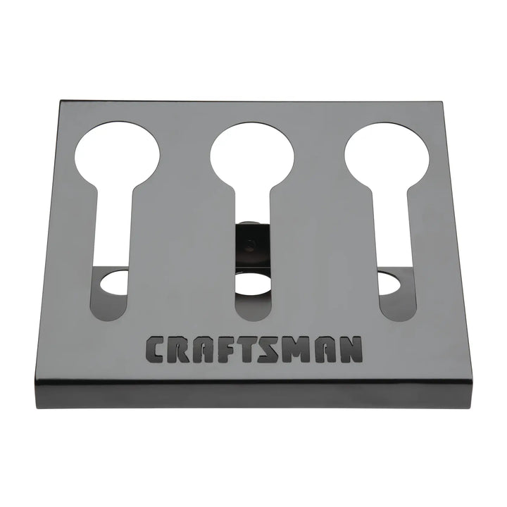 Photo of CRAFTSMAN CMST82696 metal wall-mount tool holder with three keyhole slots, front angle on white background.