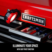 Craftsman CMST98254 pivoting LED work light attached to red tool chest, drawer open with screwdrivers.