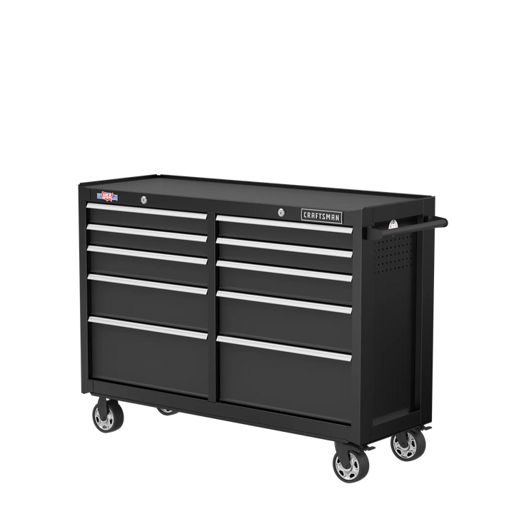 Photo of Craftsman black rolling tool chest with nine drawers, side handle, and visible wheels, SKU CMST98273BK, angled view.
