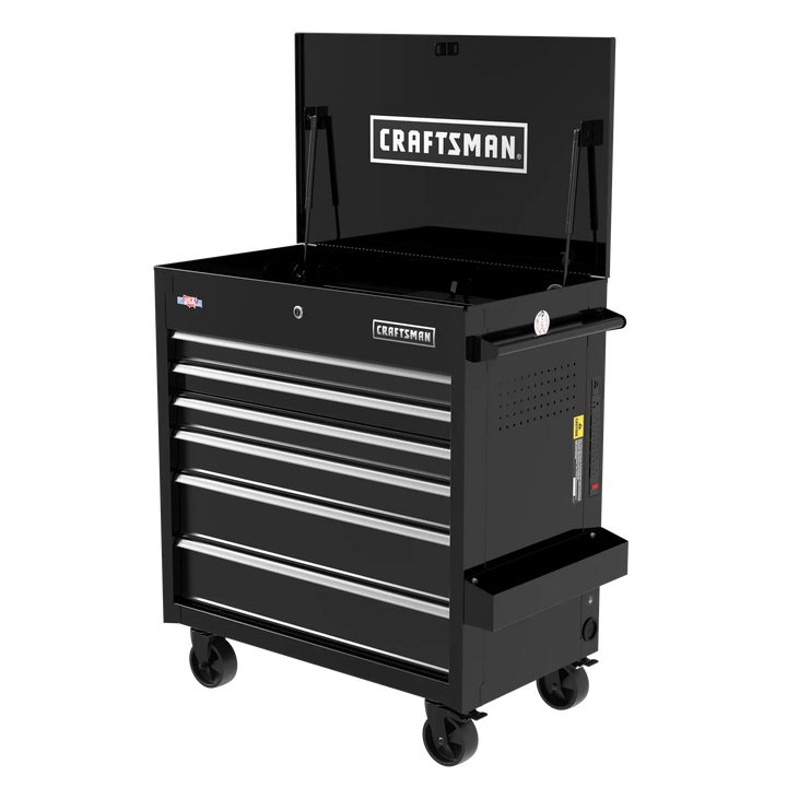 A black rolling tool chest with six drawers and an open top compartment. The chest is on four caster wheels for mobility, has a handle on the side, and displays the CRAFTSMAN logo on the top lid and front drawer.