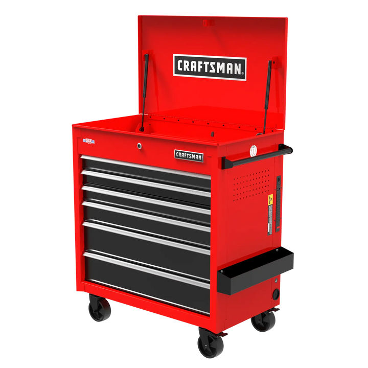 A red rolling tool chest with multiple drawers and an open top compartment labeled 'CRAFTSMAN.' The tool chest is on caster wheels and has a side handle for mobility.