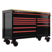 A large black metal rolling tool chest with multiple red-handled drawers and a wood top. The tool chest has caster wheels for mobility and is part of the Craftsman Series.