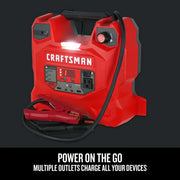 Craftsman portable power station CMXCESM256, red casing, front angle, outlets and jumper cables visible.