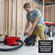 Photo of Craftsman wet dry vacuum CMXEVBE17040 in use, showing filter installation in a workshop setting.