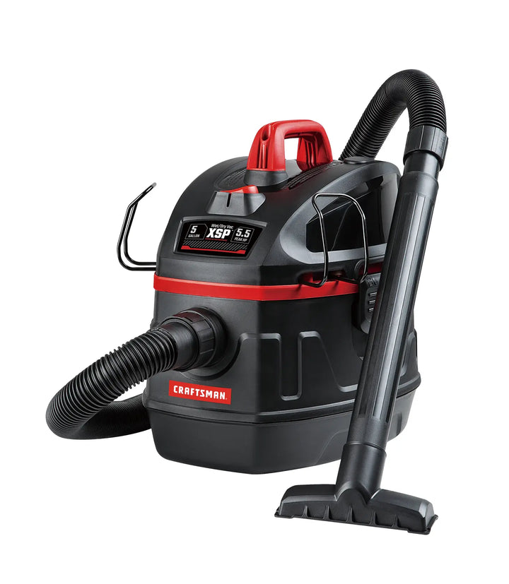 Photo of Craftsman wet/dry vacuum, black and red, with hose and floor attachment, SKU CMXEVCVVFB511, front angle.