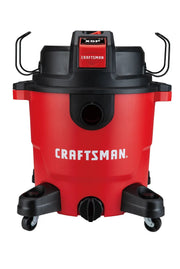Front angle photo of Craftsman wet/dry vacuum, model CMXEVCVVJH1211, red and black with wheels on white background.