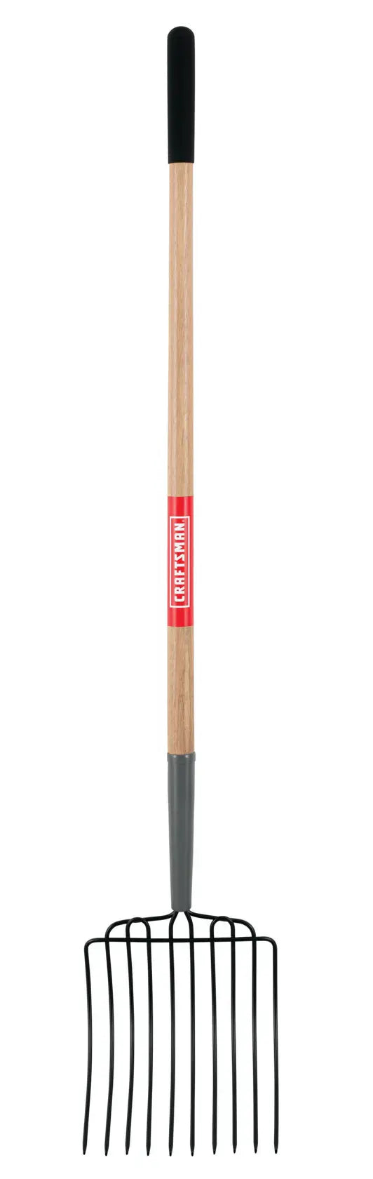 A pitchfork with a wooden handle, black grip, and several long, metal tines, commonly used for gardening or farming.