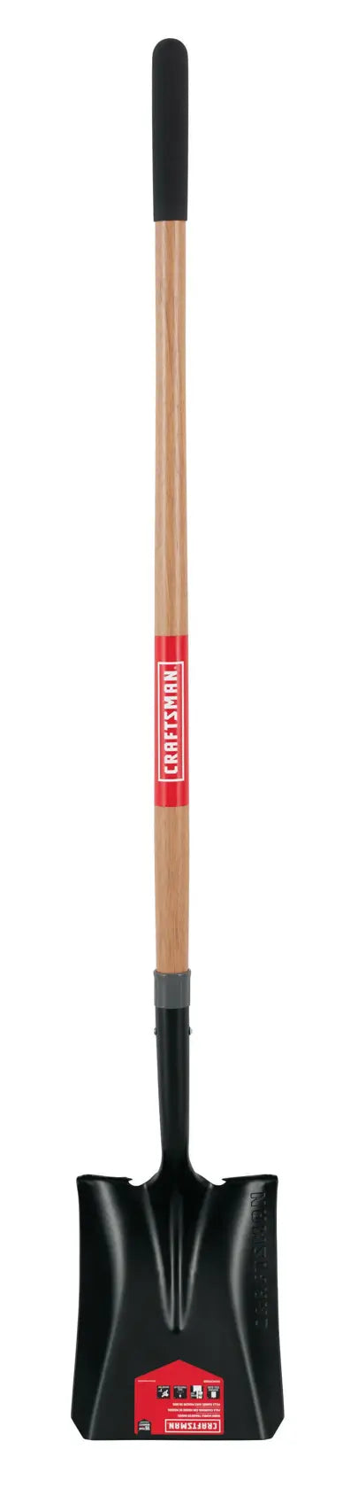 A long-handled square shovel with a wooden shaft, a black blade, and a black rubber grip at the top. The handle has a red and white label.