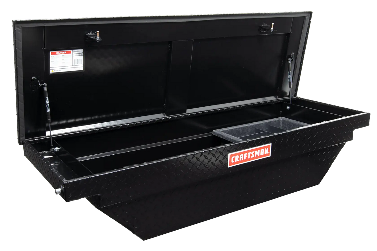 Photo of Craftsman CMXTBAD73217204 black truck storage box with diamond plate design, open lid, front angle.