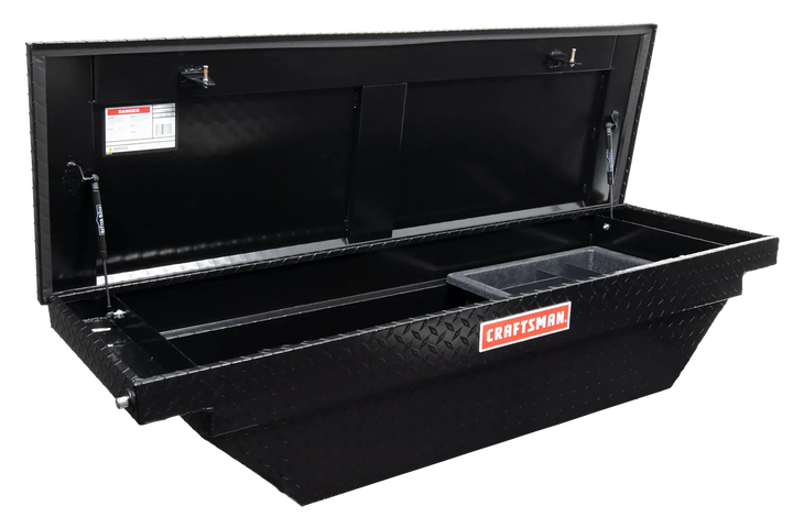 Photo of Craftsman CMXTBAD73217204 black truck storage box with diamond plate design, open lid, front angle.