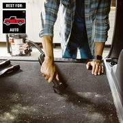 Photo of person using Craftsman auto vacuum CMXZVBE38610 to clean car carpet, vacuum and accessories visible.
