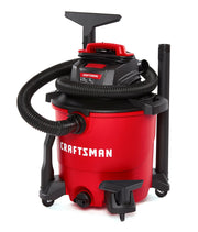 Front angle photo of Craftsman wet/dry vacuum, red, with hose and attachments, SKU CMXZVBE38683.