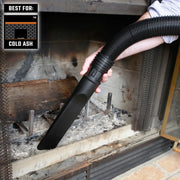 Craftsman vacuum nozzle CMXZVBE38735 cleaning cold ash in fireplace, close-up view.