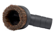 A close-up image of a round vacuum brush attachment with a ring of bristles and a black plastic connector.