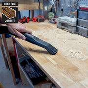 CRAFTSMAN CMXZVBE43271 graphics showing a vacuum nozzle cleaning sawdust on a workshop bench.